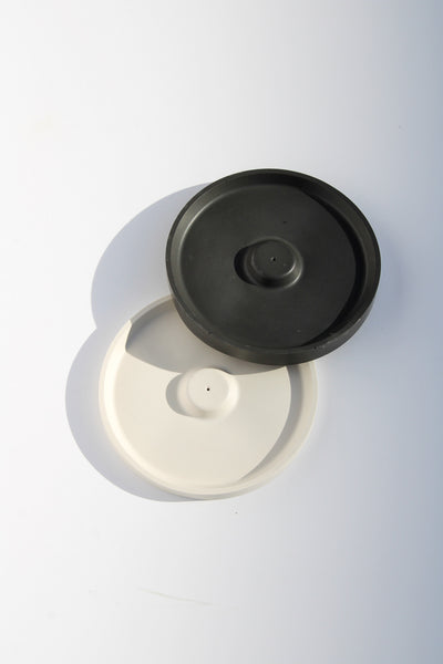 Round incense holder with minimalist design—ideal for burning incense sticks in modern or zen-inspired interiors.